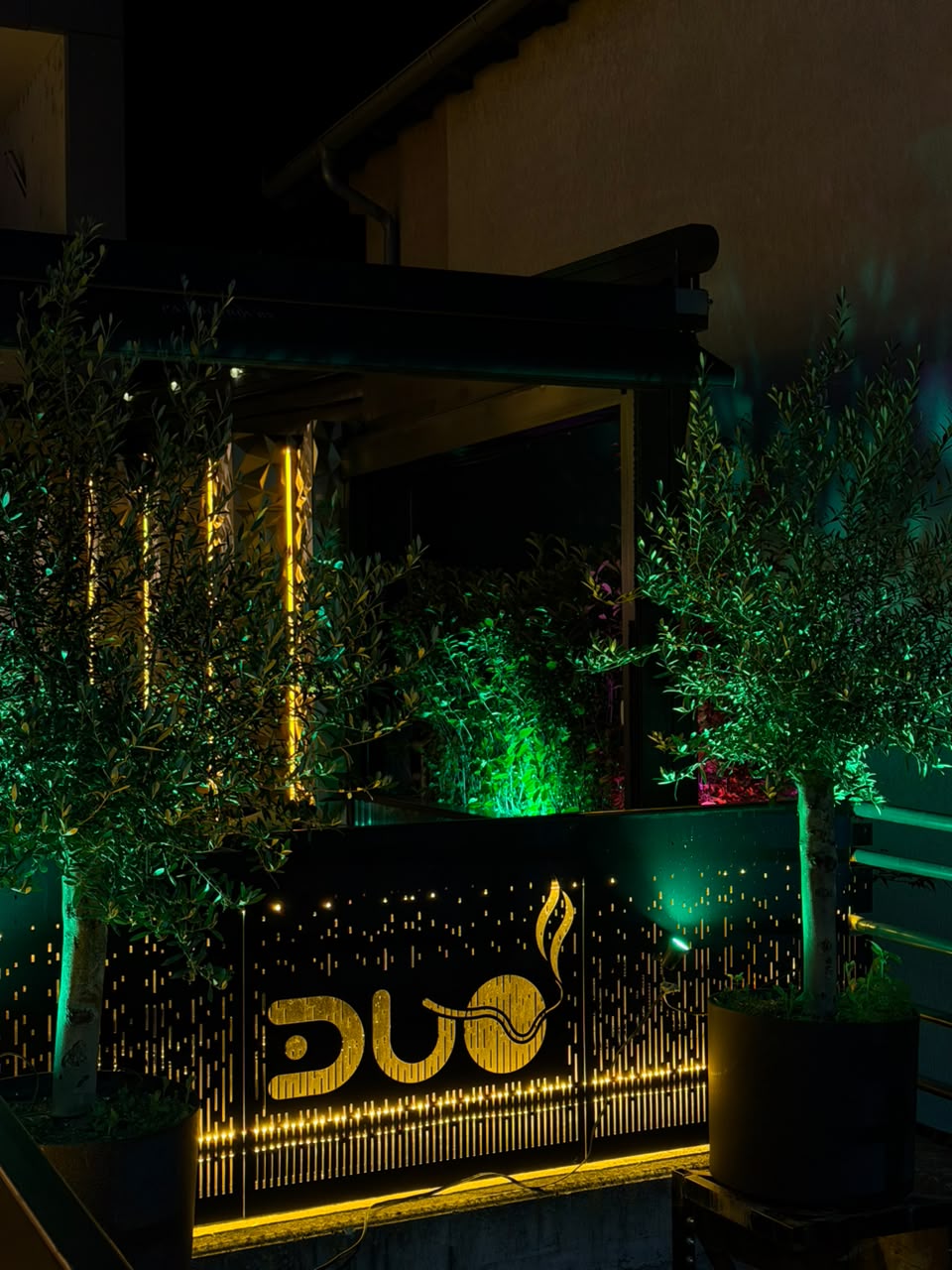 DuoCafé terrace entrance at night