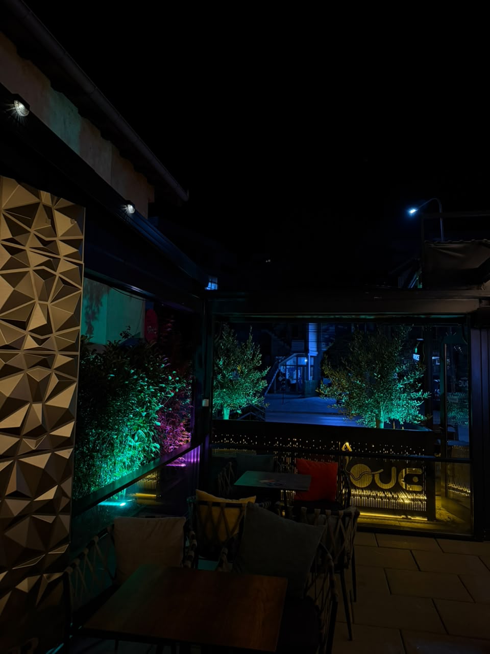DuoCafé terrace seating at night